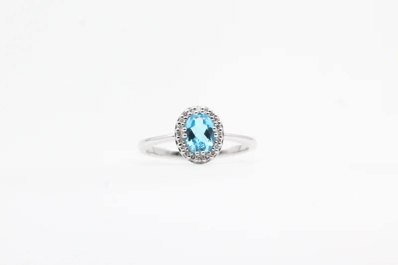 White Gold Blue Topaz Halo Ring