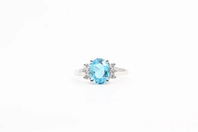 White Gold Oval Blue Topaz Ring